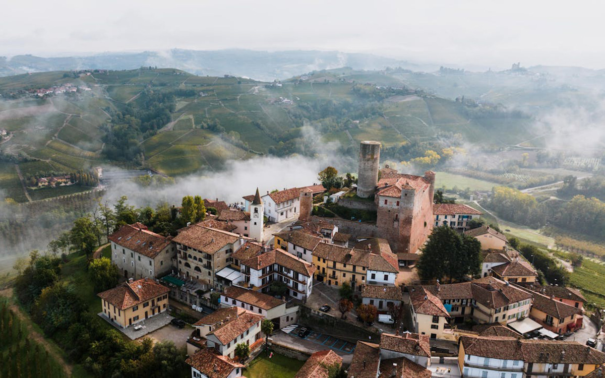 Scenic drive through vineyards and villages in Piedmont