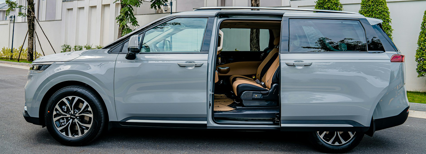 7 seater car hire interior with sliding door open showing second row seats