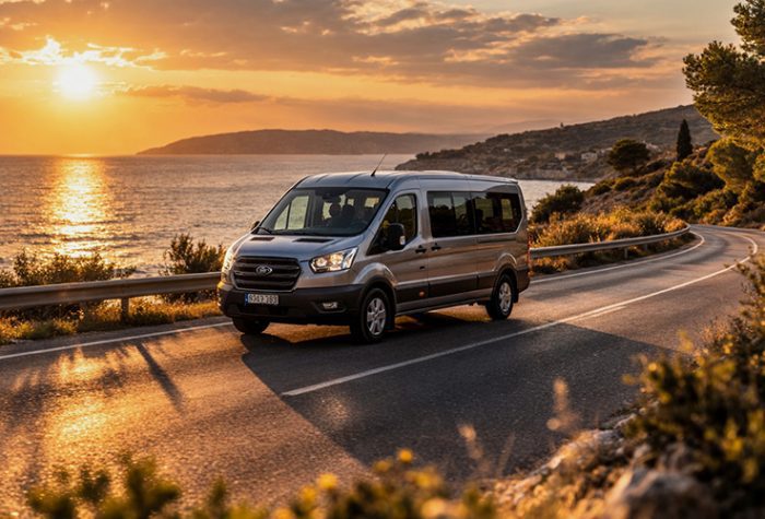 coastal road spacious 8 seater car hire, passenger van driving along coastline during golden hour road trip